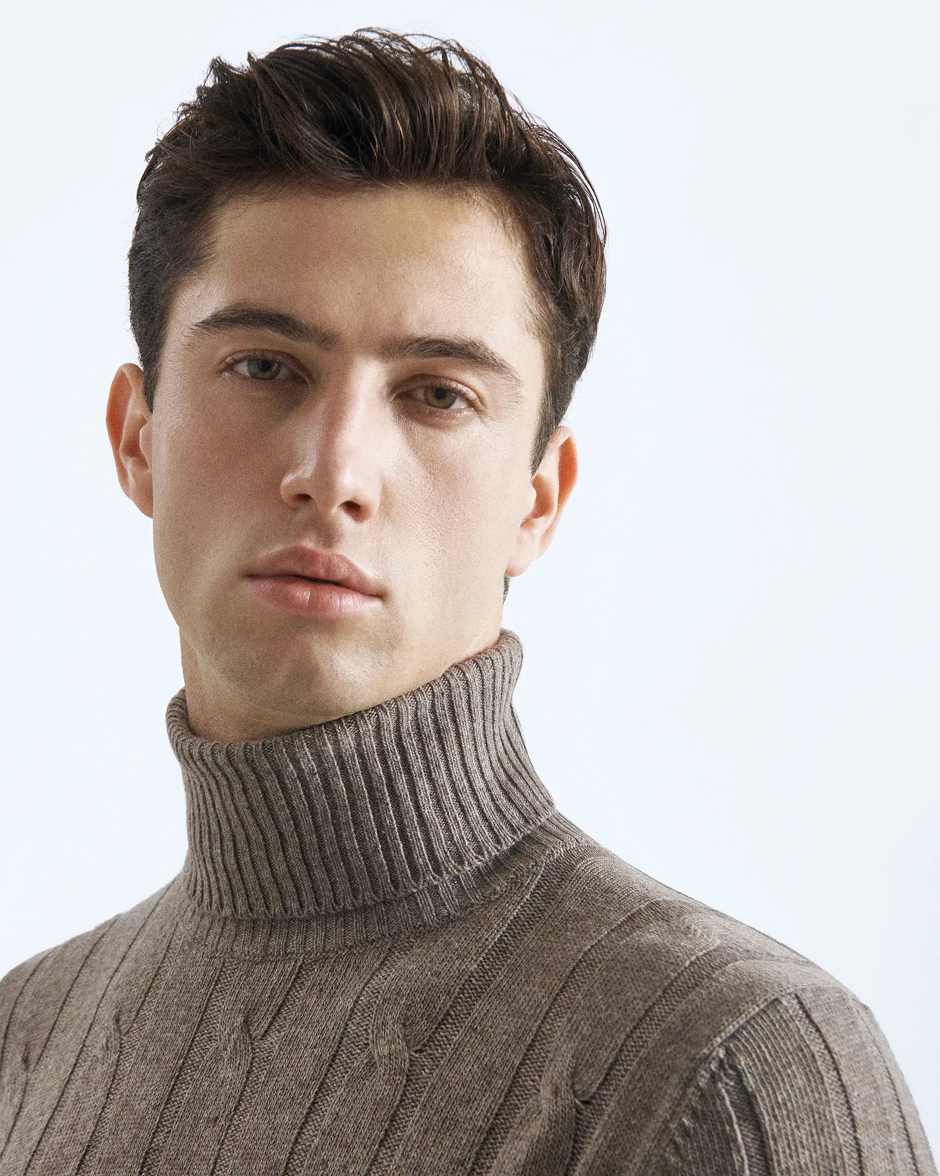 Beige turtleneck in cashmere blend with braided workmanship