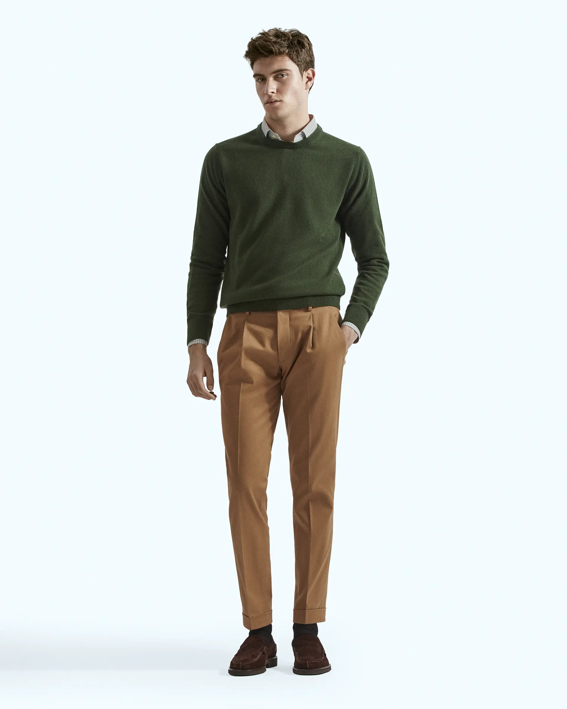 Brown trousers in stretch gabardine with pleats and side button placket