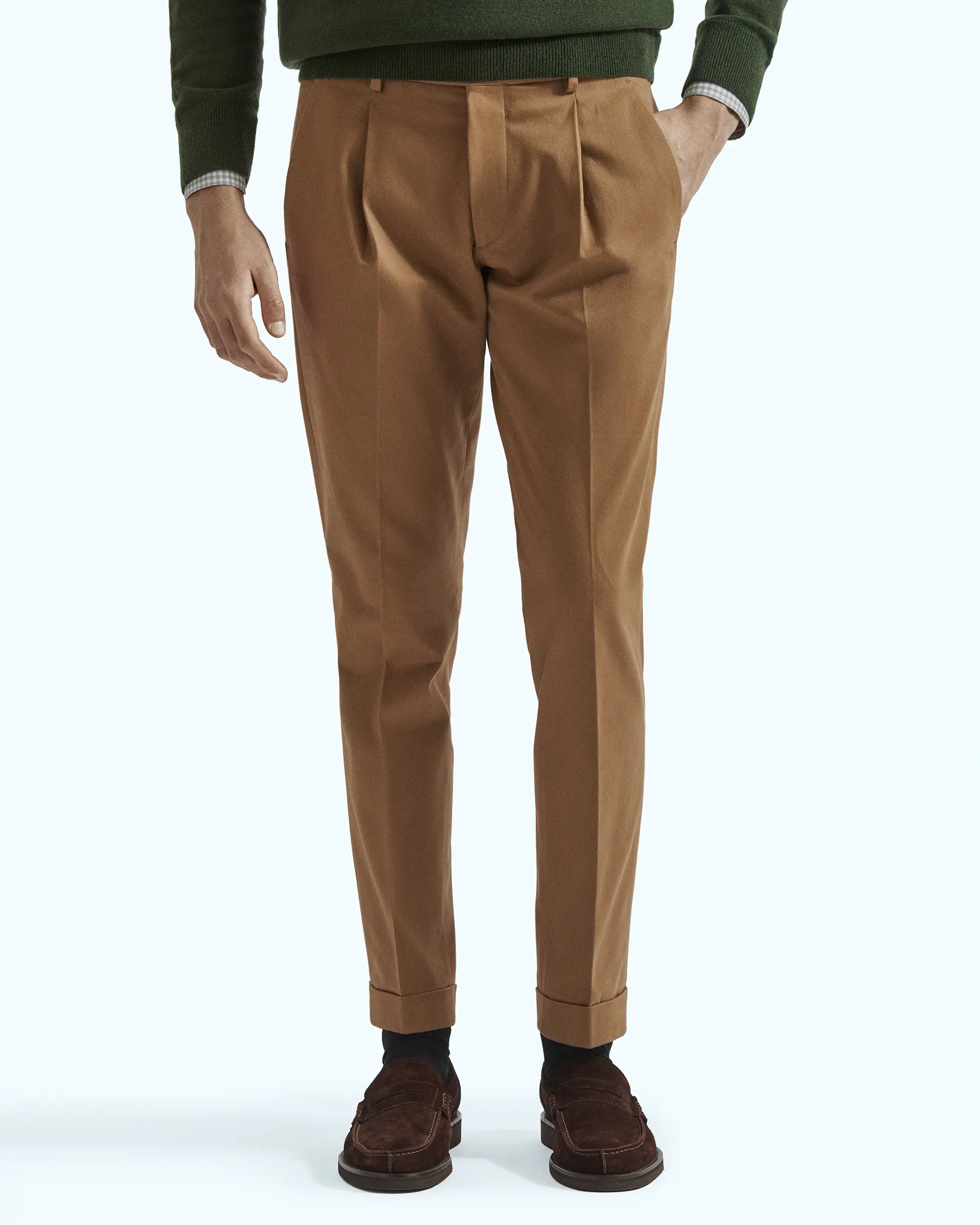 Brown trousers in stretch gabardine with pleats and side button placket