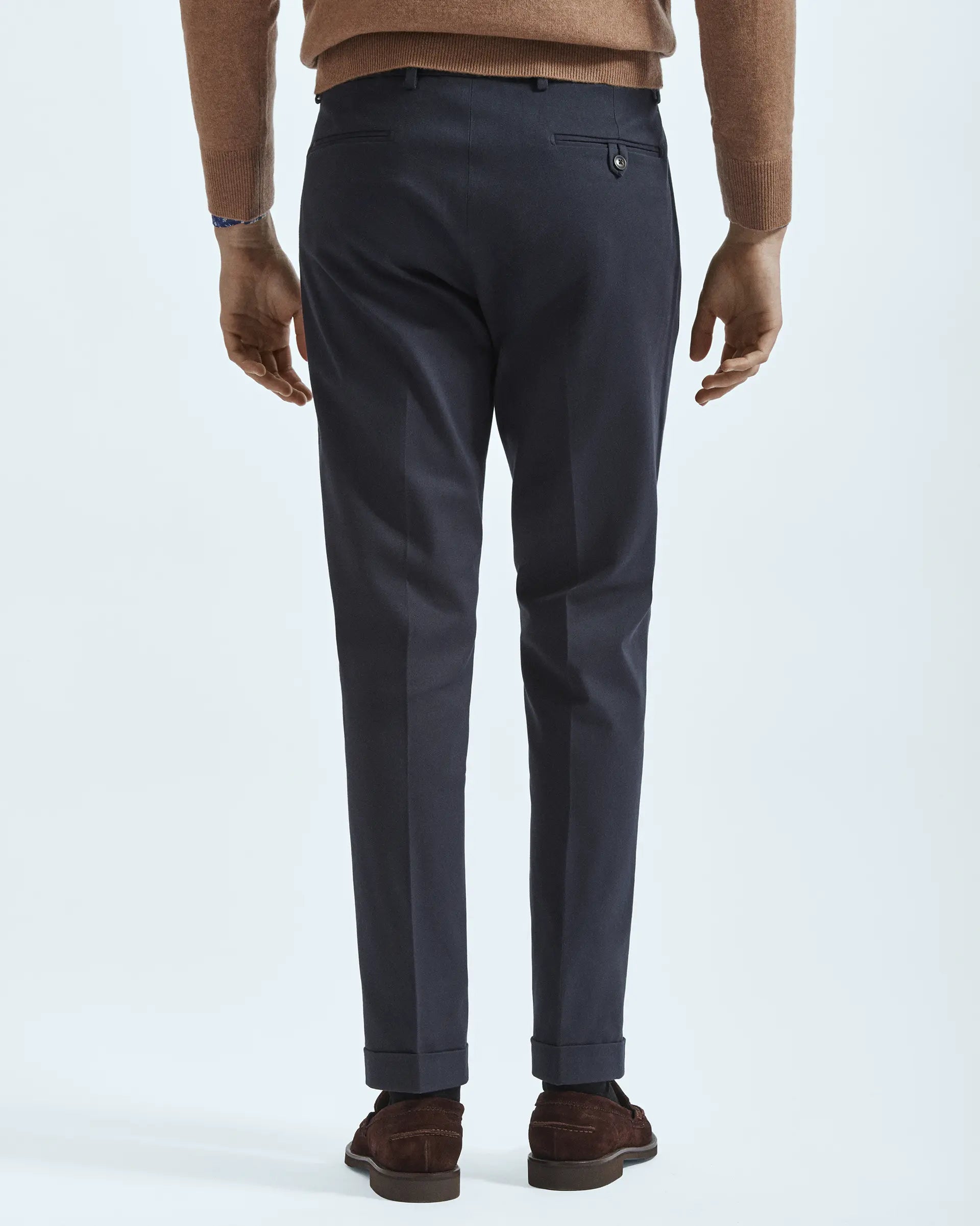 Grey trousers in stretch gabardine with pleats and side button placket