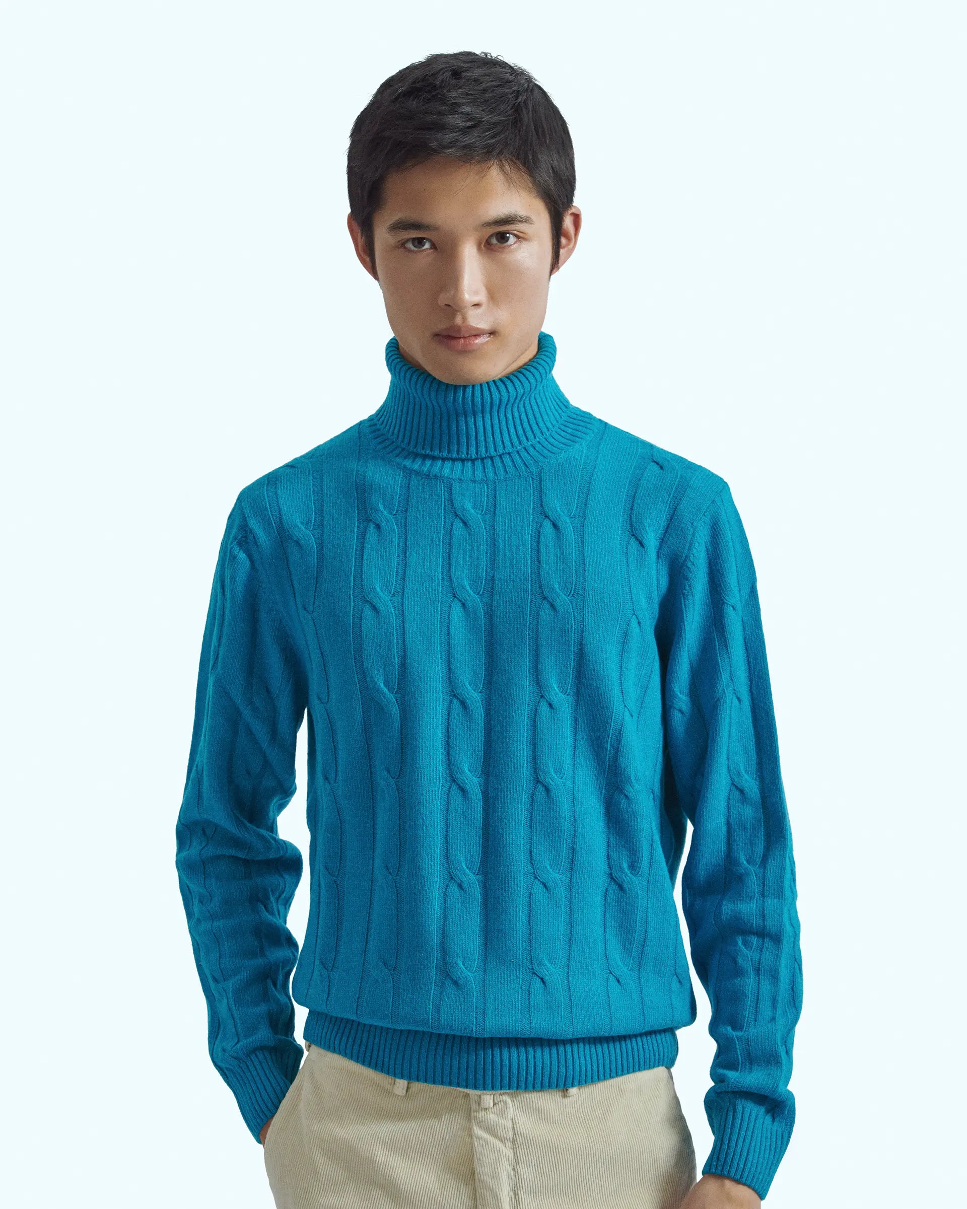 Blue turtleneck in cashmere blend with braided workmanship