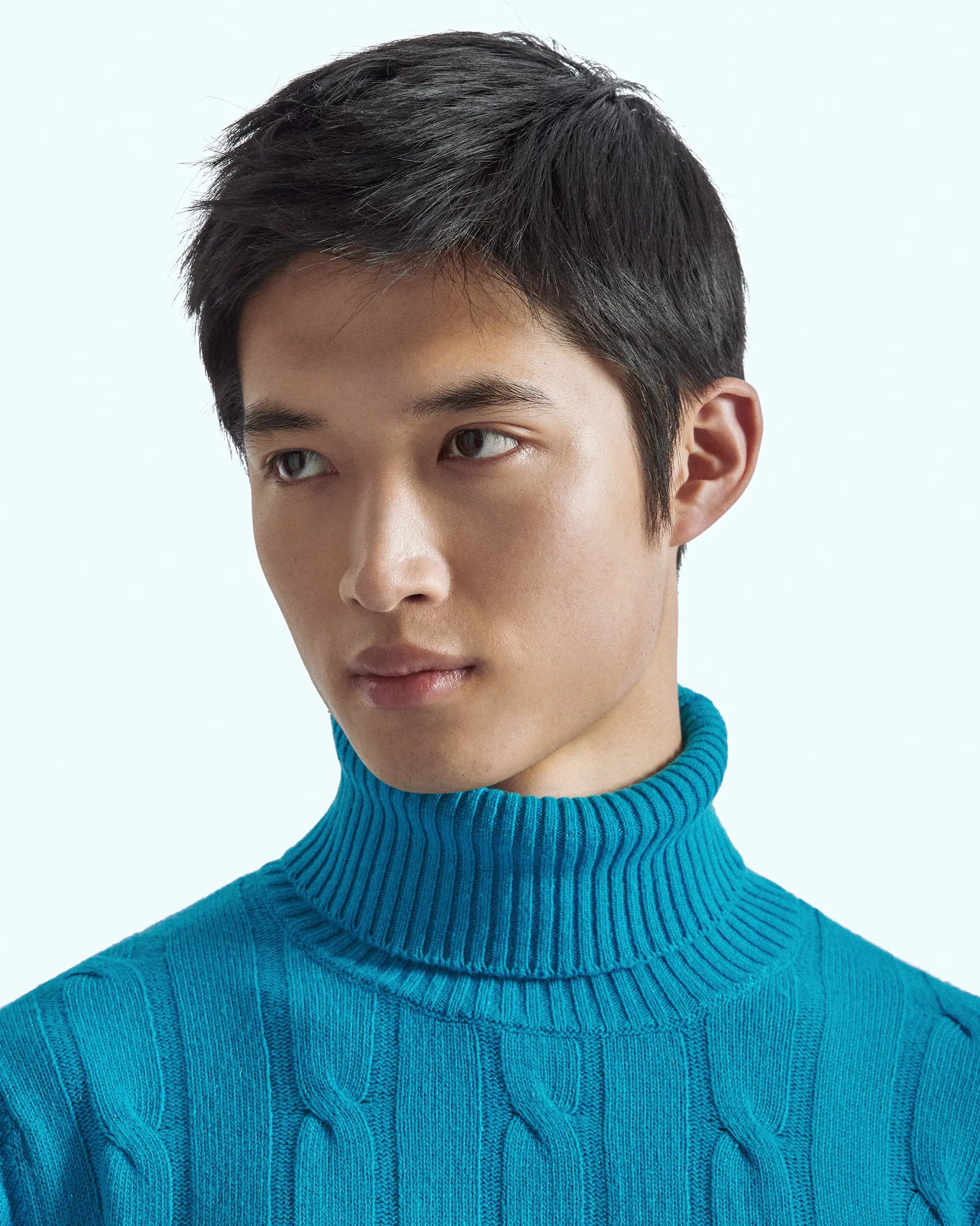 Blue turtleneck in cashmere blend with braided workmanship