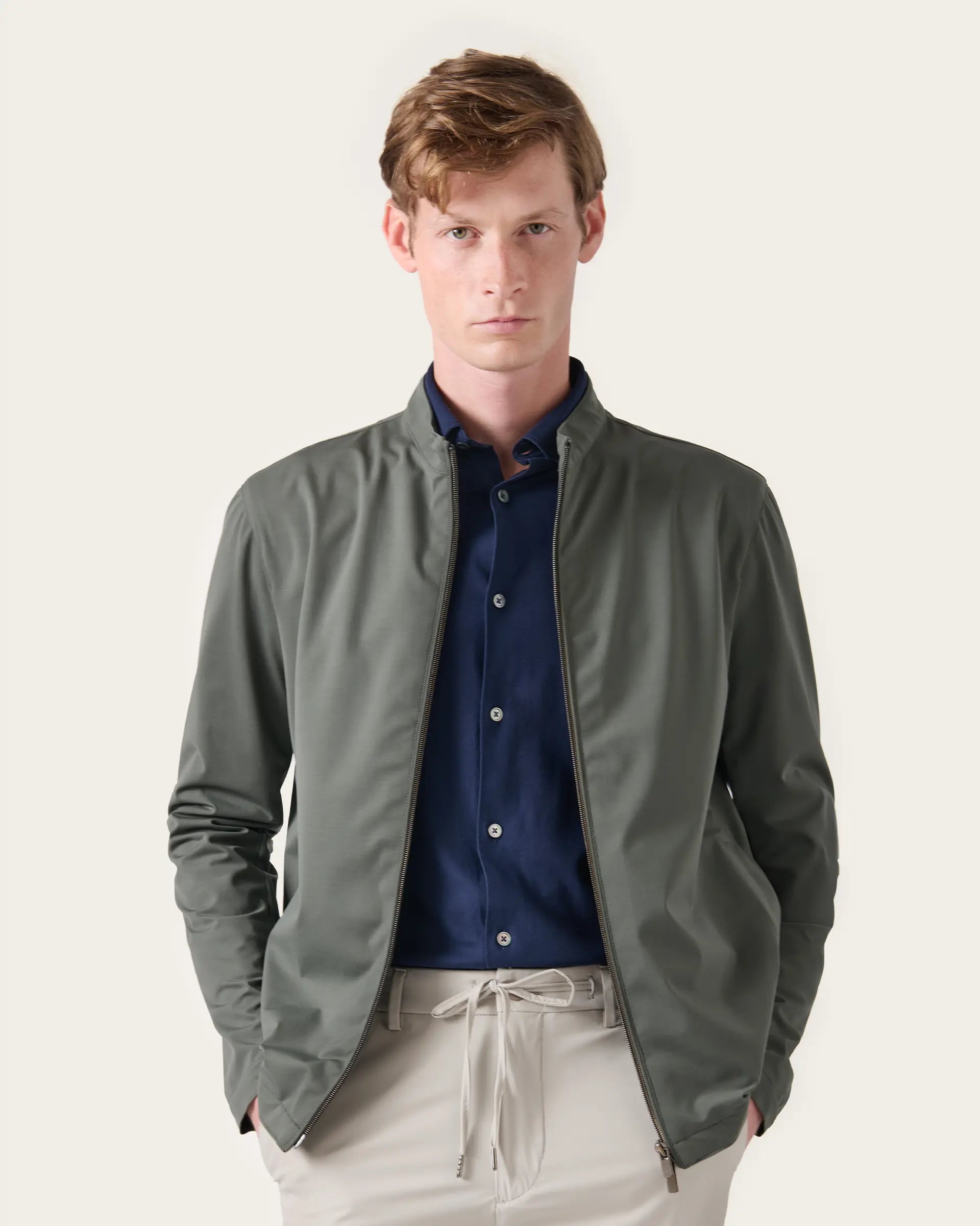 Green zip jacket in excellent stretch technical fabric