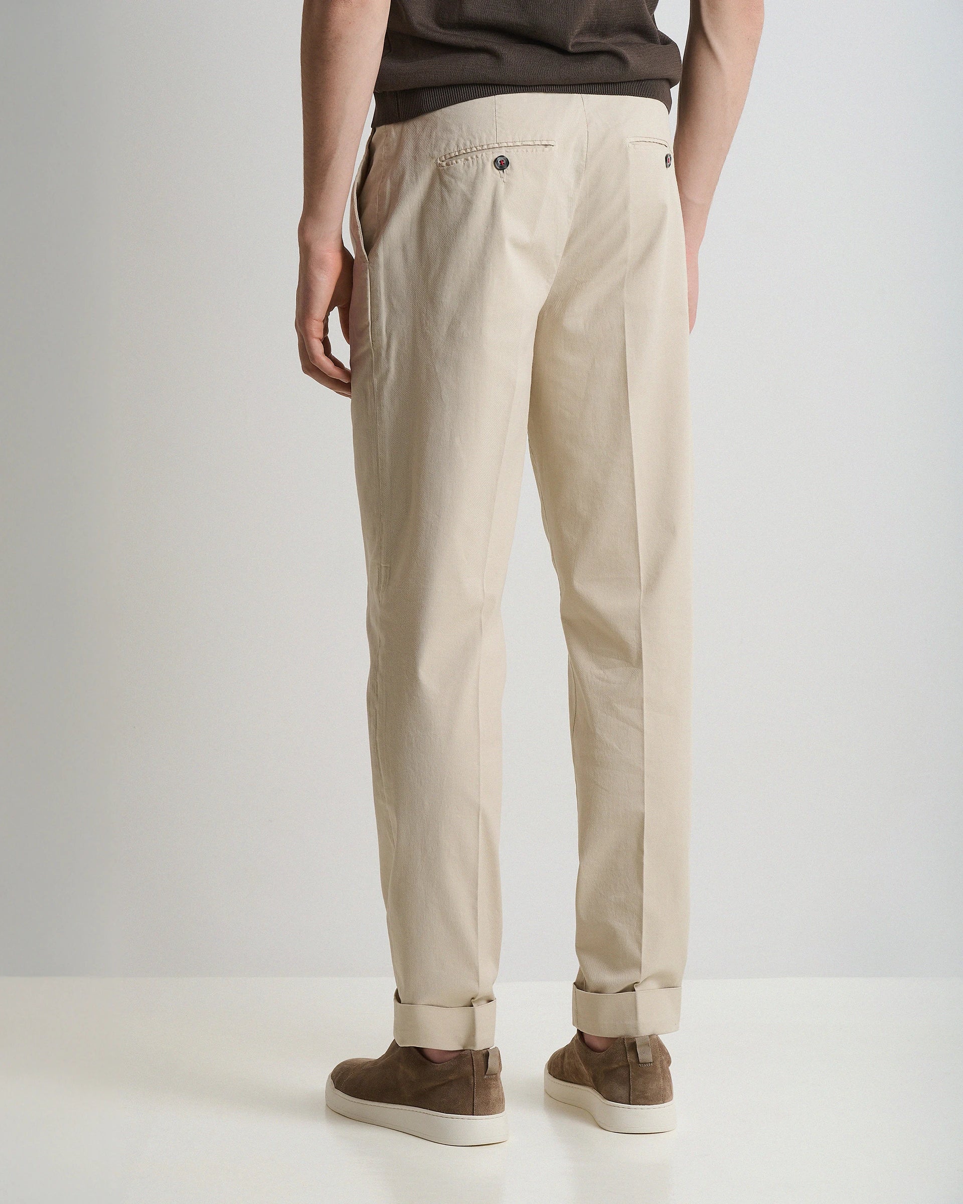Beige Cotton Stretch carrot Pants with pleats and button fastening